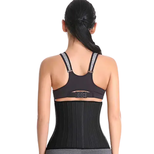 Appareil d’entraînement de la taille ou corset qui se porte sur le torse d’une personne.